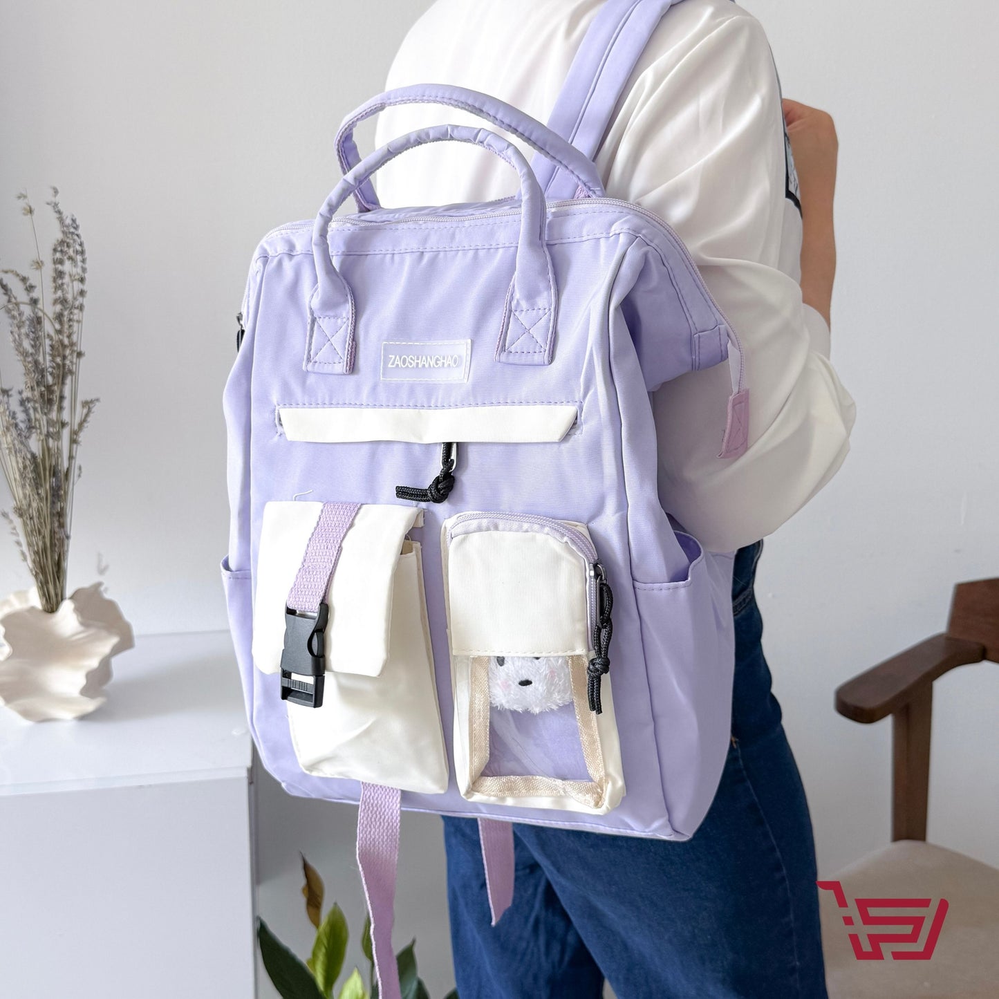 حقيبة ظهر مع مدالية الدب