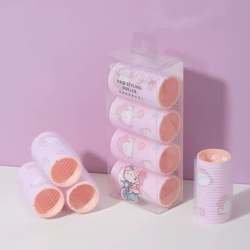 رولات شعر 4 قطع اشكال كارتونية