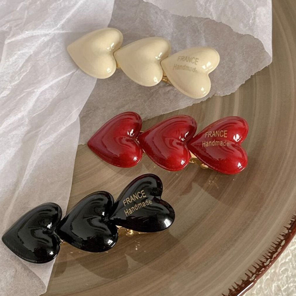 قراصة شعر شكل قلب