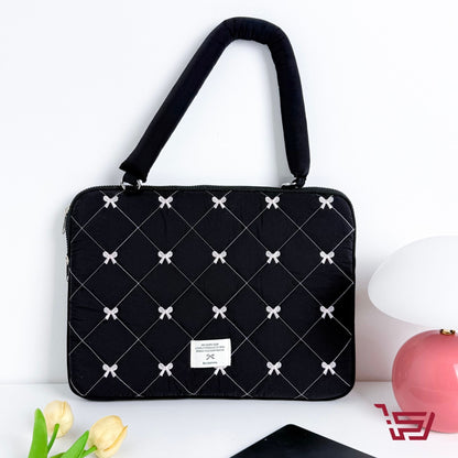 حقيبة ايباد وحاسبة مبطنة بطبعات الفيونكة