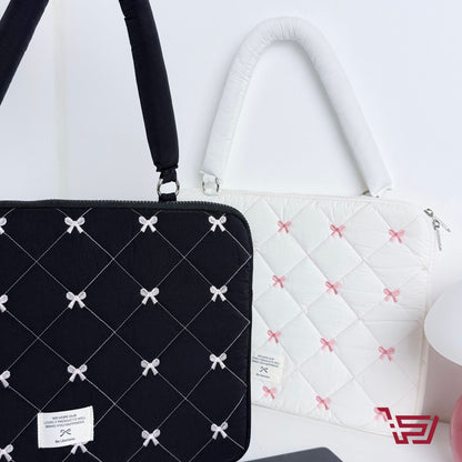 حقيبة ايباد وحاسبة مبطنة بطبعات الفيونكة