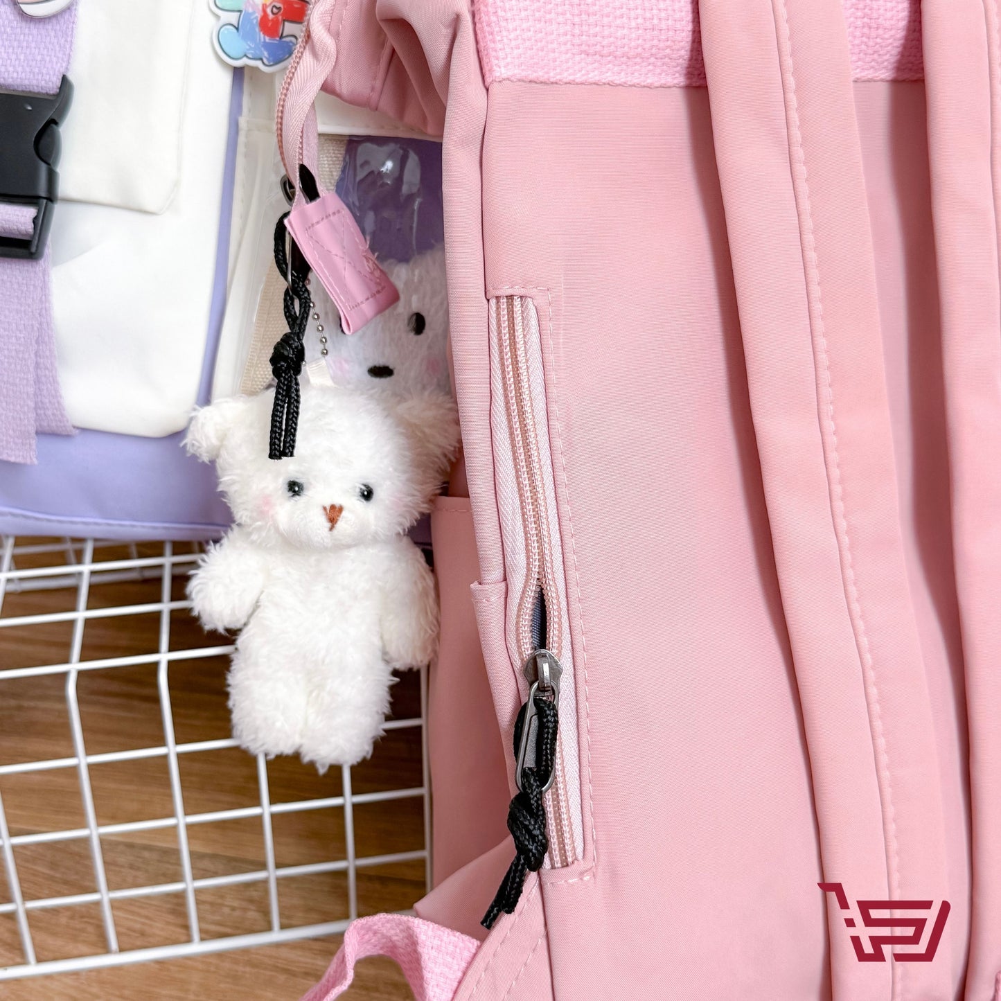 حقيبة ظهر مع مدالية الدب