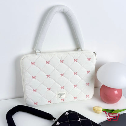 حقيبة ايباد وحاسبة مبطنة بطبعات الفيونكة