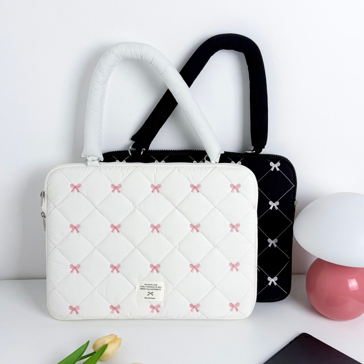 حقيبة ايباد وحاسبة مبطنة بطبعات الفيونكة