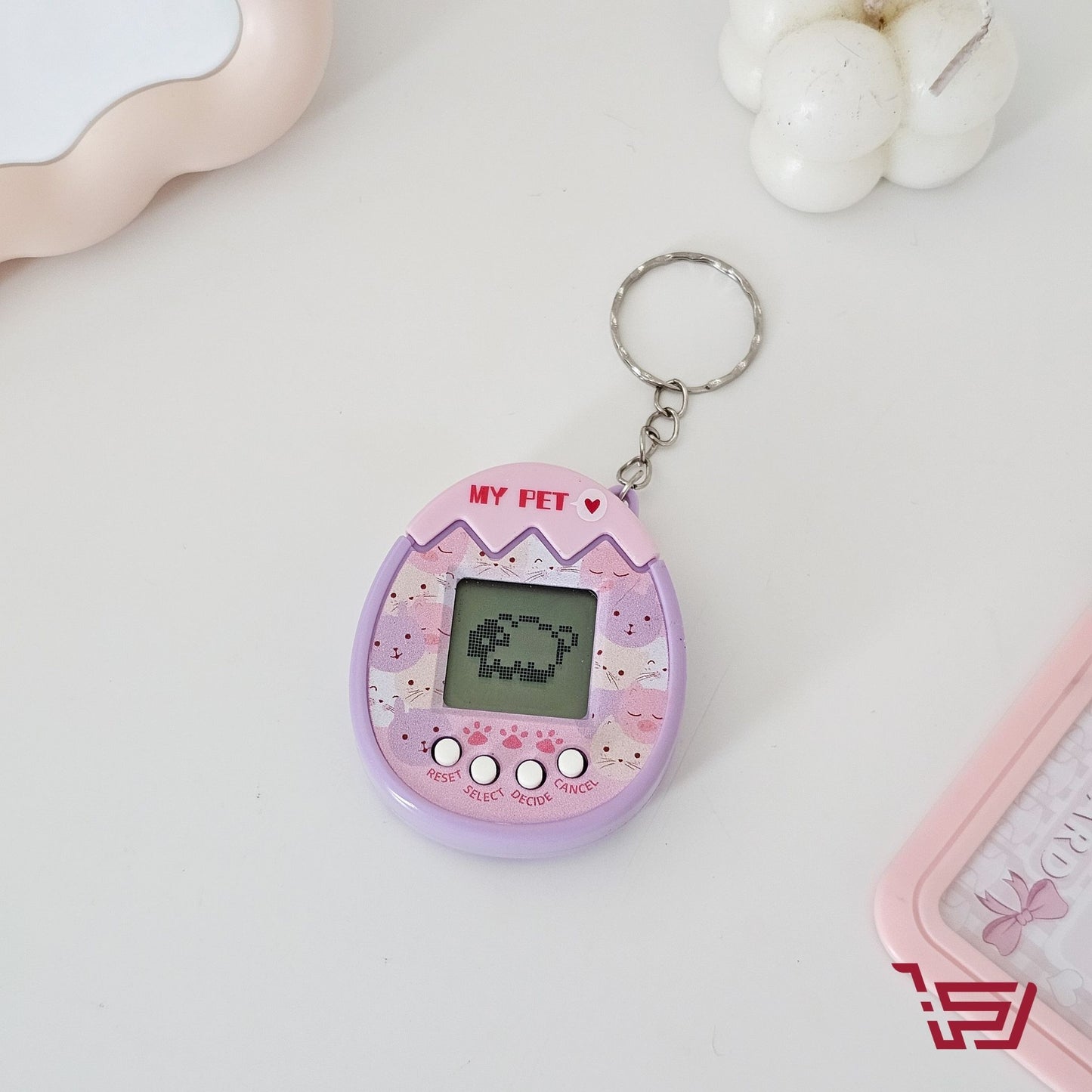 مدالية و جهاز العاب صغير my pet