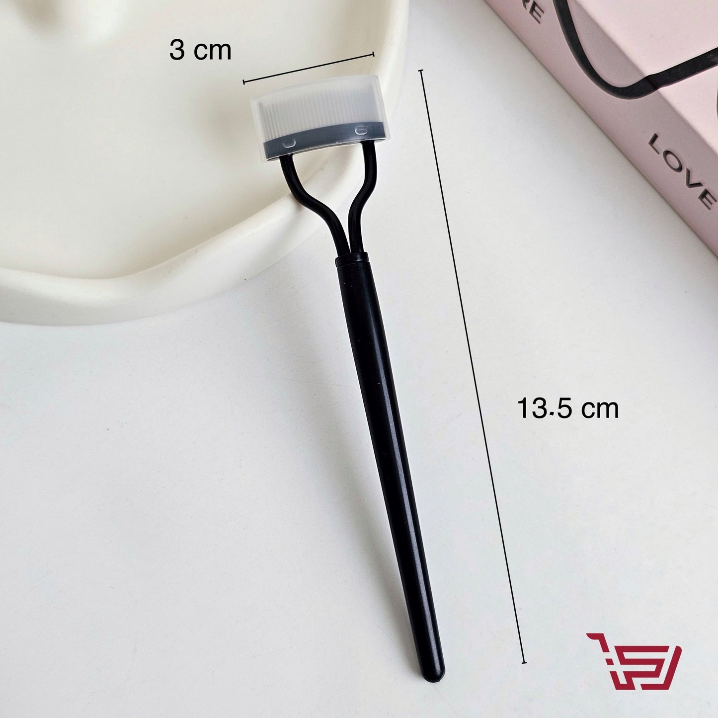 اداة فصل الرموش بأسنان معدنية