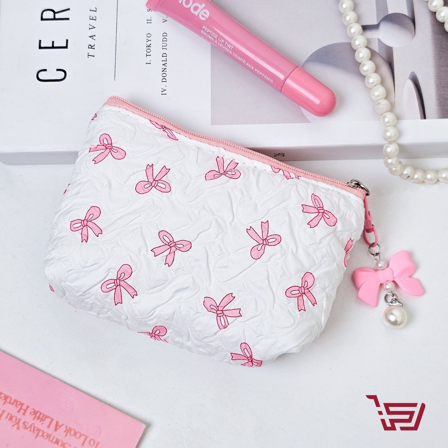 محفظة مكياج بطبفات الفيونكة