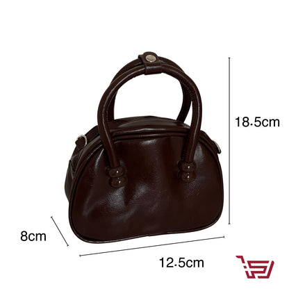 حقيبة يد جلد صغيرة