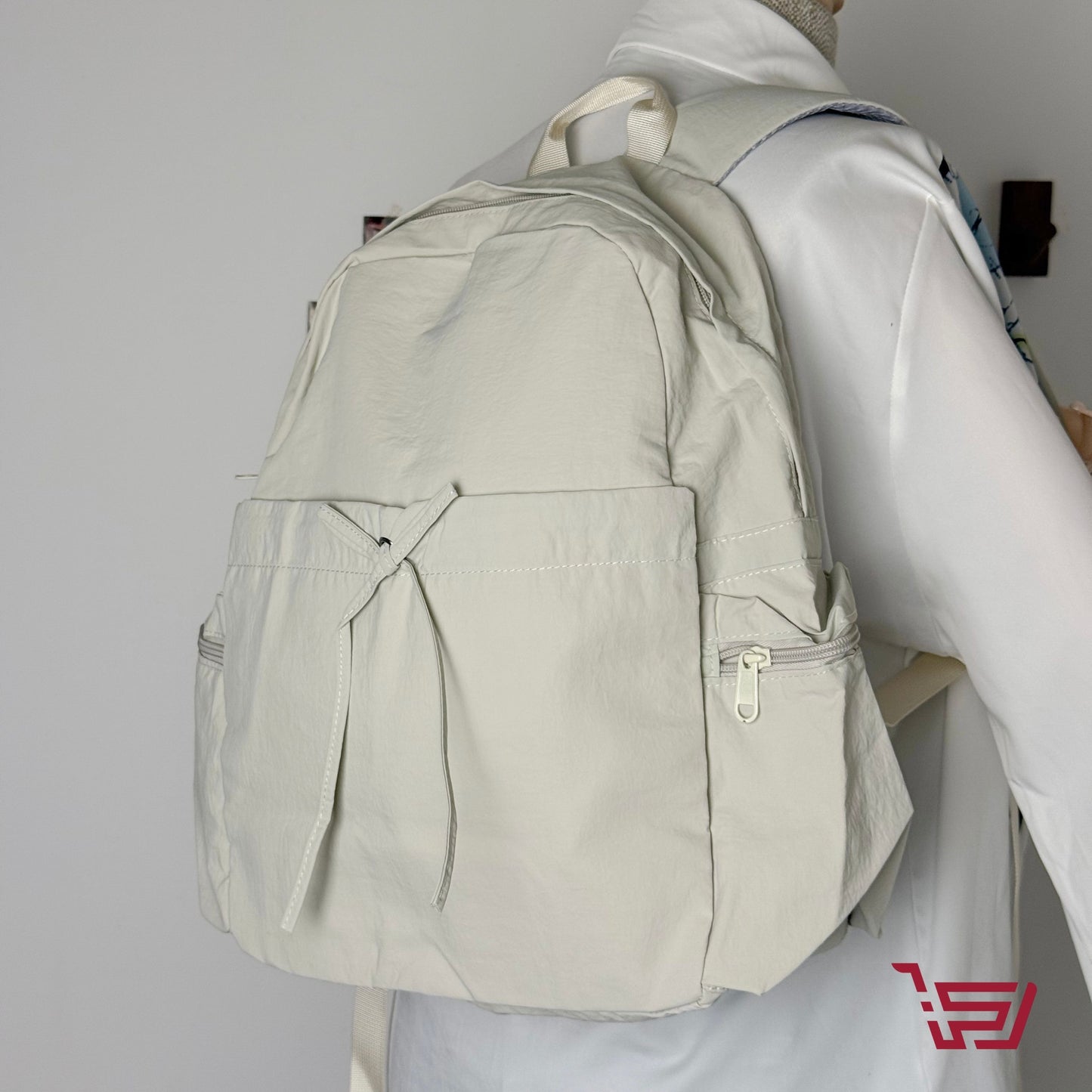 حقيبة ظهر قماش مطري بربطة الفيونكة