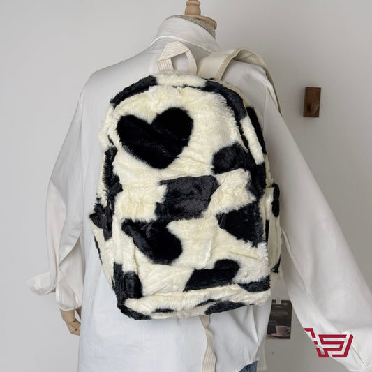 حقيبة ظهر فرو منقطة