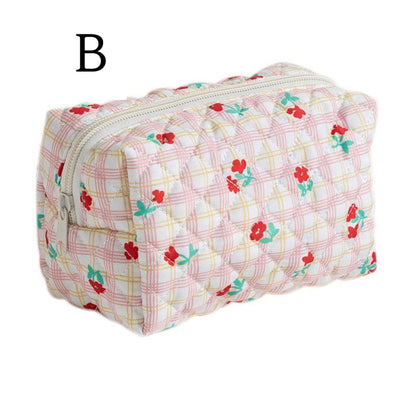 محفظة مكياج بطبعات مختلفة