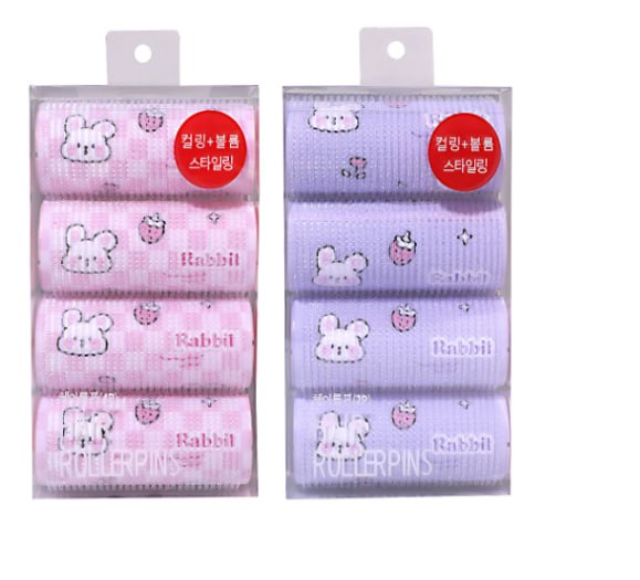 رولات تجعيد الشعر وردي